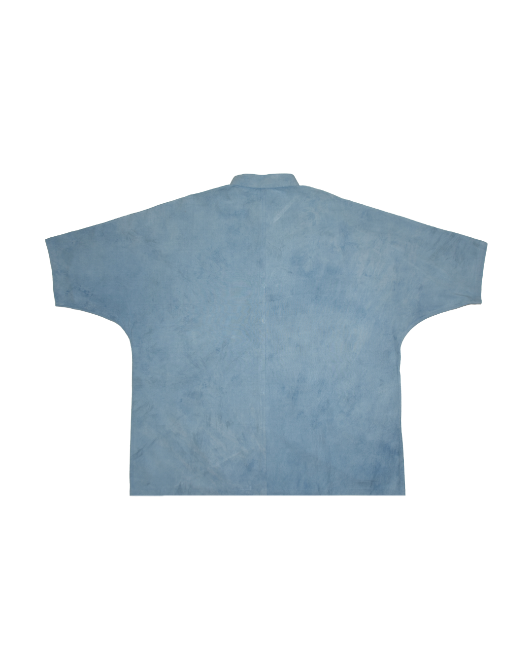 Natural indigo dyed shirt on a white background - small batch